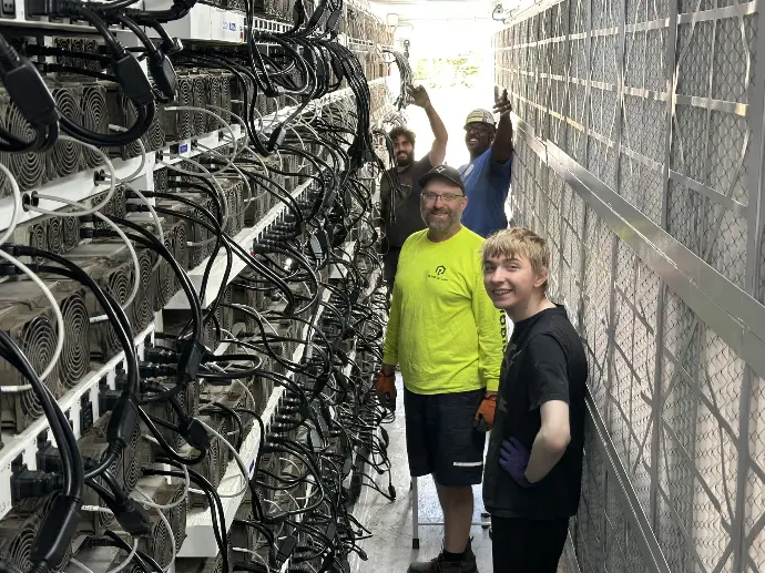 on-site technicians deploying ASIC miners